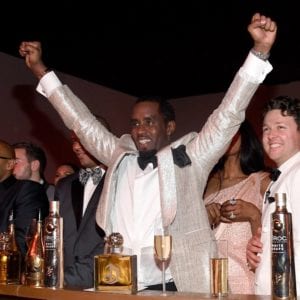 kanye west and jay z shake hands at diddy 50th birthday party